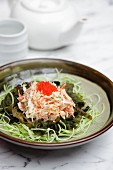 Octopus salad on a bed of seaweed (Asia)