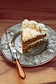 Slice of Double Layer Carrot Cake with Cream Cheese Frosting
