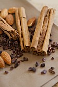 Cinnamon sticks, almonds and cacao nibs