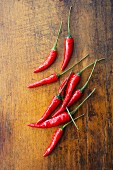 Thai peppers on a wooden surface