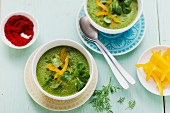 A green smoothie made from figs, yellow peppers, courgettes and lambs lettuce served as a soup
