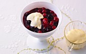 Red berry compote with vanilla cream