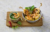 Prawn skewers with a chilli and coriander vinaigrette