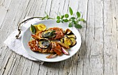 Saltimboca with an aubergine and shallot medley