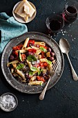 Penne with roasted aubergines, peppers and basil