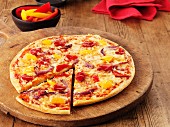 Vegetable pizza with peppers, sliced