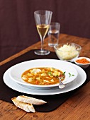Bouillabaisse with ciabatta and cheese