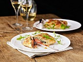 Salmon in puff pastry with rocket