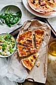 Quiche Lorraine with parsley and salad