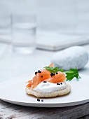 Blinis with smoked salmon, caviar, cream cheese and rocket