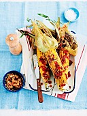 Barbecued corn cobs with sun-dried tomato