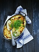 Potato bake with anchovies and dill