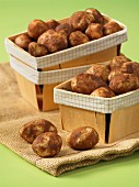 Marzipan potatoes in wooden baskets