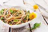 Wholemeal spaghetti with dandelions and ricotta