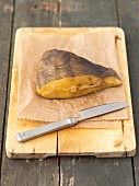Smoked halibut on a chopping board