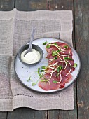 Smoked tuna with a horseradish and dill sauce and sunflower shoots