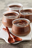 Chocolate pudding in glass jars