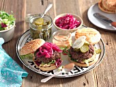 Beef burgers with caramelised onions and gherkins