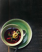 Beetroot and lemongrass broth with herb pancakes