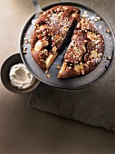 Warm chocolate and pear cake with hazelnuts