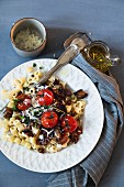 Pasta with aubergines, tomatoes and cheese
