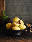 Potato dumplings filled with bread and buttered crumbs