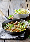 Turkey ragout with apples and rocket
