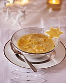 Cream of cheese soup with Parmesan stars for Christmas