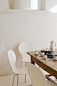 Rustic wooden table in white, modern kitchen