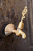 Safranbolu; water dripping from a tap on a fountain, Turkey (close-up)
