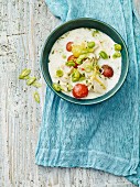 Coconut soup with broad beans and chicken