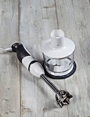 A hand mixer with a food blender