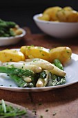 White and green asparagus with new potatoes