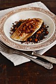 Fish fillet with cinnamon puy lentils and saffron shallots (Arabia)