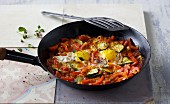 Fried peppers with fried eggs