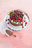 Chocolate cake with cream and fresh berries