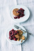 Poppyseed cakes with berry compote