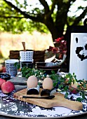 Boiled eggs on breakfast table in garden