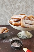 Chiacchiere (deep-fried Italian pastries) with icing sugar