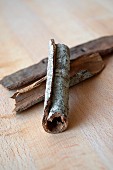 Cassia cinnamon bark on a wooden table
