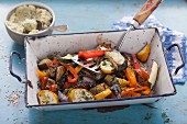 Colourful oven-roasted vegetables with a tofu dip