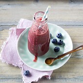 A blueberry and pear smoothie with cucumber