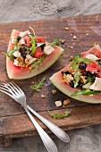 Watermelon salad with rocket, walnuts and sheep's cheese