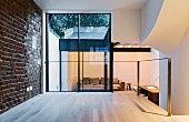 View from wooden platform into sunken living room