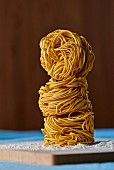 A stack of three noodle nests