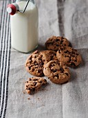 Chocolate chip cookies and a bottle of milk