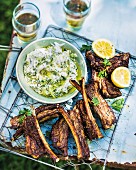 Spicy lamb ribs with tzatziki and lemon