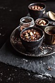 Chocolate cream with nuts and icing sugar