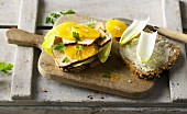 Wholemeal bread with smoked tofu, chicory and fresh oranges