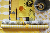 Wallpapers and fabrics in yellow and white patterns